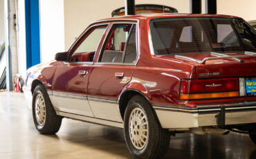 Cadillac-Cimarron-1988-Sedan-21