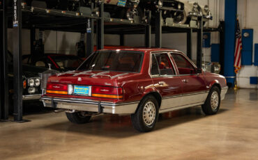 Cadillac-Cimarron-1988-Sedan-23