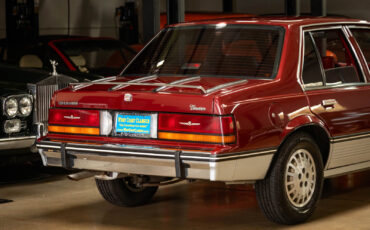 Cadillac-Cimarron-1988-Sedan-24