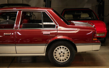 Cadillac-Cimarron-1988-Sedan-6