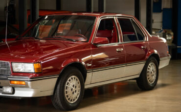 Cadillac-Cimarron-1988-Sedan-8