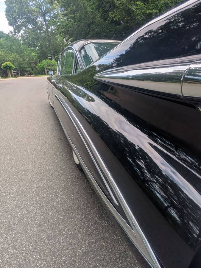 Cadillac-Fleetwood-1959-black-11