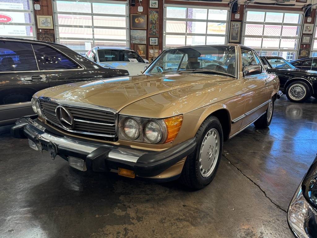Mercedes-benz-benz-560-class-1987-yellow-1