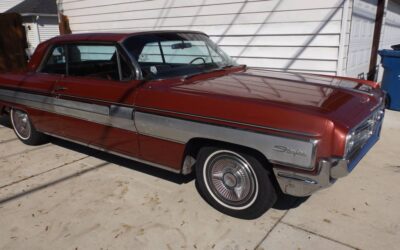 Oldsmobile Starfire  1962 red
