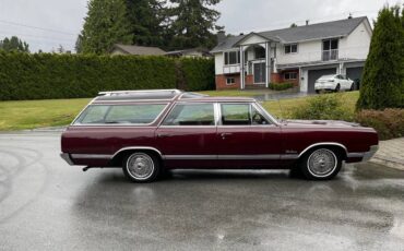 Oldsmobile-Vista-cruiser-wagon-1965-red-6