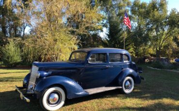 Packard-115-C-Touring-Sedan-1937-Sedan-25