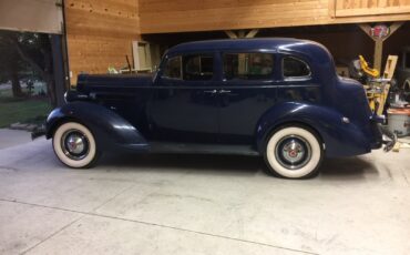 Packard-115-C-Touring-Sedan-1937-Sedan-30