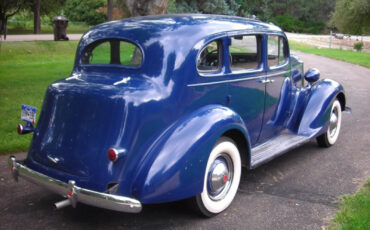 Packard-115-C-Touring-Sedan-1937-Sedan-32
