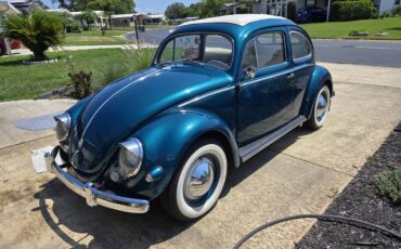 Volkswagen-Vw-bettle-3-fold-rag-top-1955