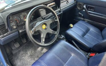 Volvo-240-1985-blue-13