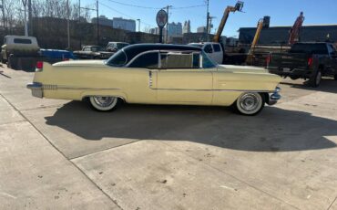 Cadillac-Coupe-deville-1956-yellow-1