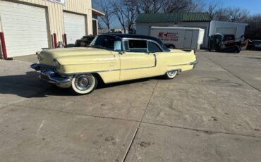 Cadillac-Coupe-deville-1956-yellow-5
