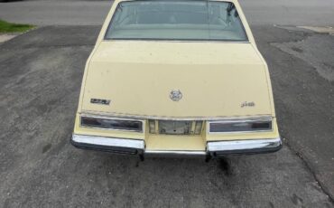 Cadillac-Seville-1985-yellow-1