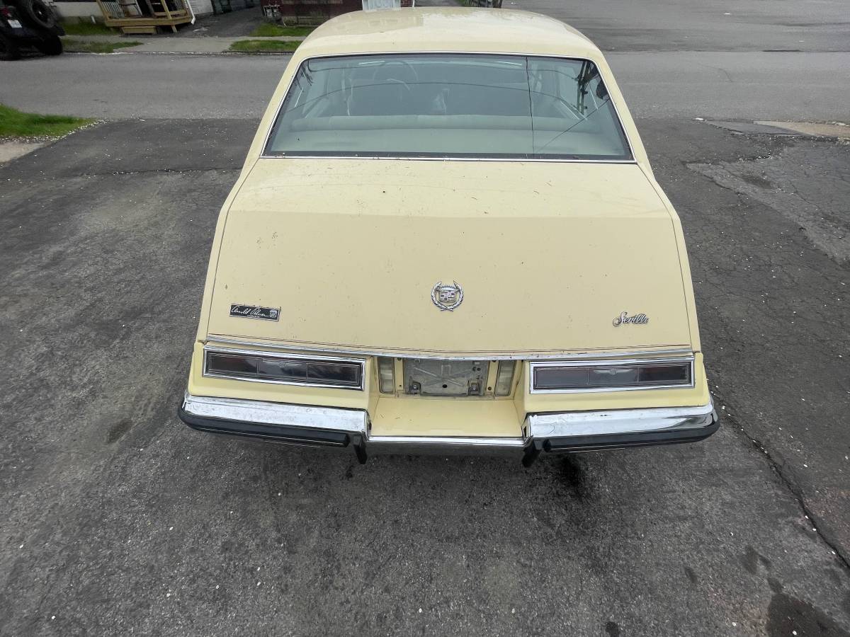 Cadillac-Seville-1985-yellow-1