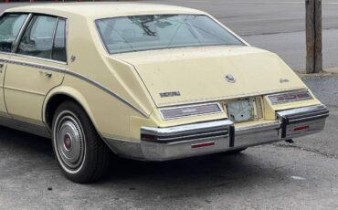 Cadillac-Seville-1985-yellow-10