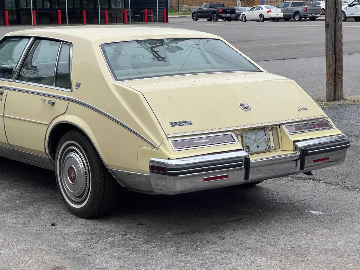 Cadillac-Seville-1985-yellow-10