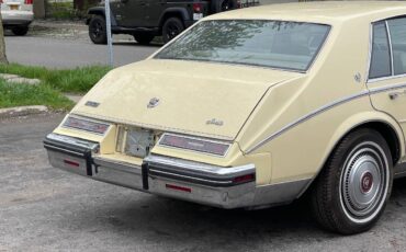 Cadillac-Seville-1985-yellow-11