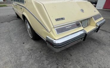 Cadillac-Seville-1985-yellow-3