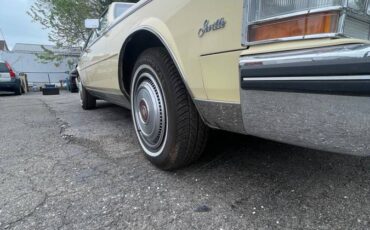 Cadillac-Seville-1985-yellow-4