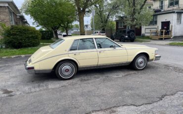 Cadillac-Seville-1985-yellow-8