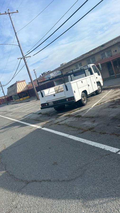 Gmc W4 4500 medium duty med tilt 67.9 bbc  1995 white