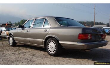 Mercedes-Benz-500-Series-1986-Sedan-15