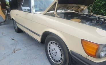 Mercedes-benz-450-sl-1977-yellow-1
