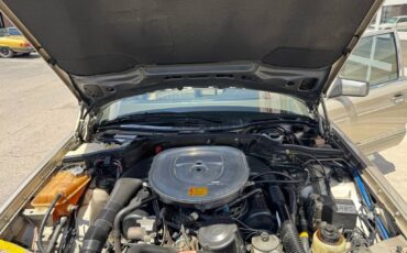 Mercedes-benz-benz-560-class-1988-yellow-17