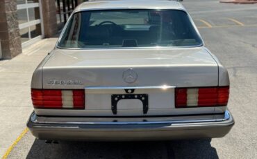 Mercedes-benz-benz-560-class-1988-yellow-5