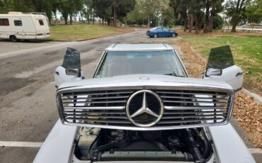 Mercedes-benz-benz-560-sl-1988-white-13