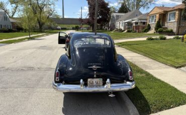 Oldsmobile-Series-76-2dr-sedan-1950-black-2