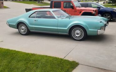 Oldsmobile-Toronado-deluxe-survivor-1966-blue-1