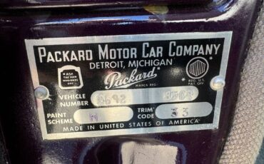 Packard-Clipper-touring-sedan-1953-purple-1