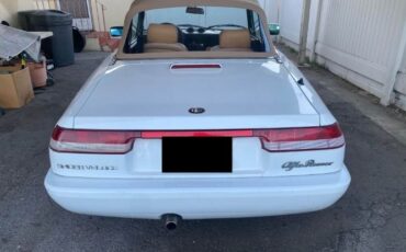 Alfa-romeo-Spider-1991-White-Tan-3