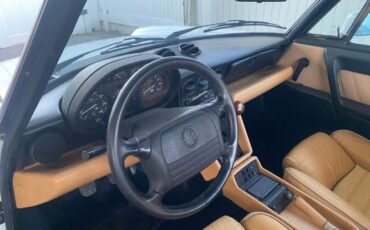 Alfa-romeo-Spider-1991-White-Tan-8