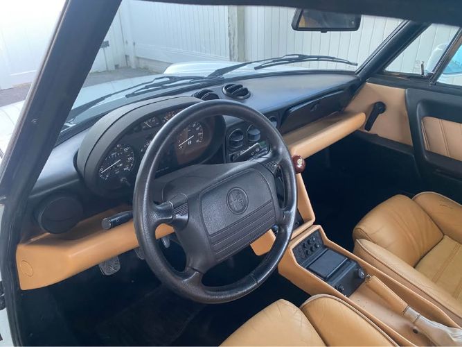 Alfa-romeo-Spider-1991-White-Tan-8