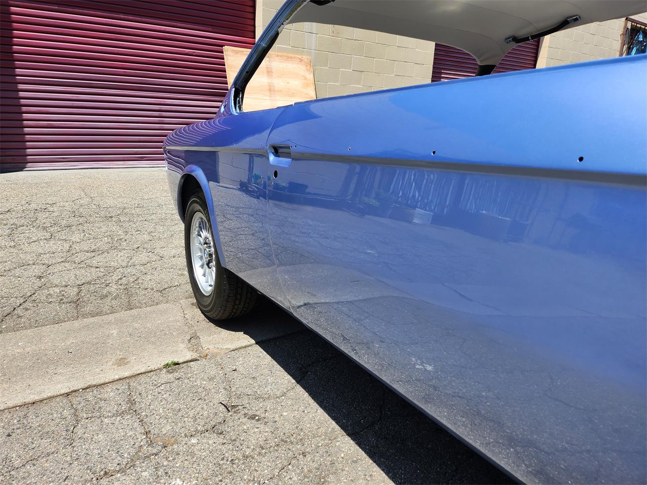Bmw-3.0csi-1972-Fjord-Blue-Saddle-32