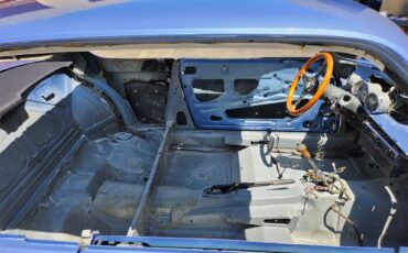 Bmw-3.0csi-1972-Fjord-Blue-Saddle-49