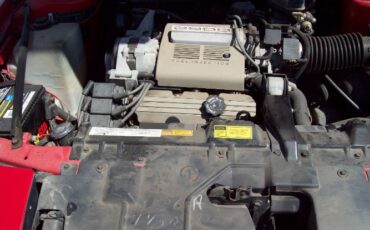 Buick-Reatta-1988-Red-Sadle-2