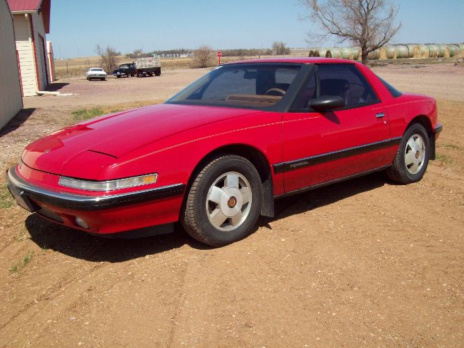 Buick-Reatta-1988-Red-Sadle-5