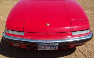 Buick-Reatta-1988-Red-Sadle-6