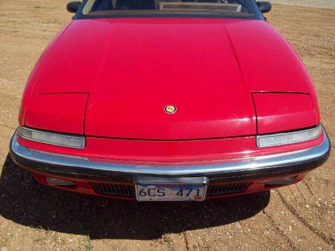 Buick-Reatta-1988-Red-Sadle-6
