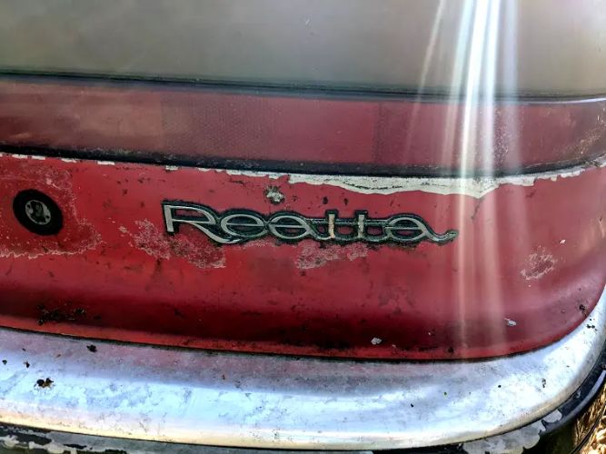 Buick-Reatta-1988-Red-Tan-Cloth-11