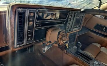 Buick-Reatta-1988-Red-Tan-Cloth-7