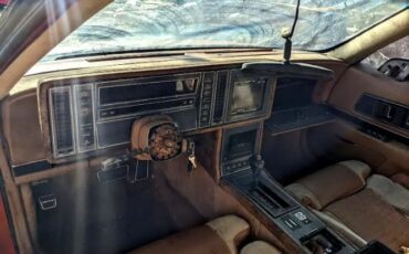 Buick-Reatta-1988-Red-Tan-Cloth-8