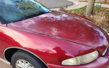 Buick-Riviera-1995-Red-Patina-finish-Tan-leather-1