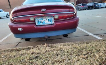 Buick-Riviera-1995-Red-Patina-finish-Tan-leather-10
