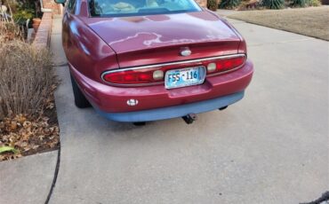 Buick-Riviera-1995-Red-Patina-finish-Tan-leather-11