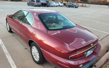 Buick-Riviera-1995-Red-Patina-finish-Tan-leather-12