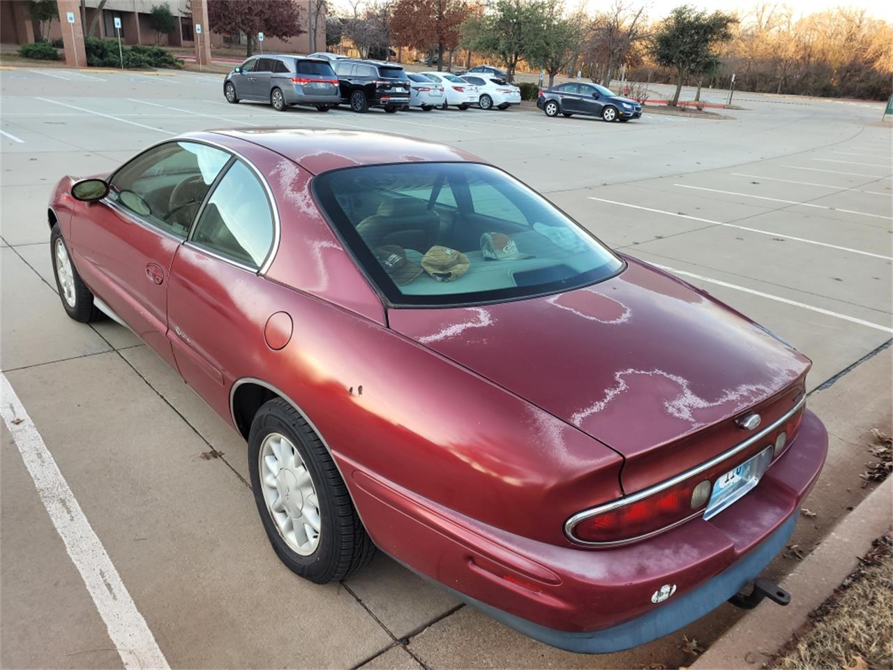 Buick-Riviera-1995-Red-Patina-finish-Tan-leather-12